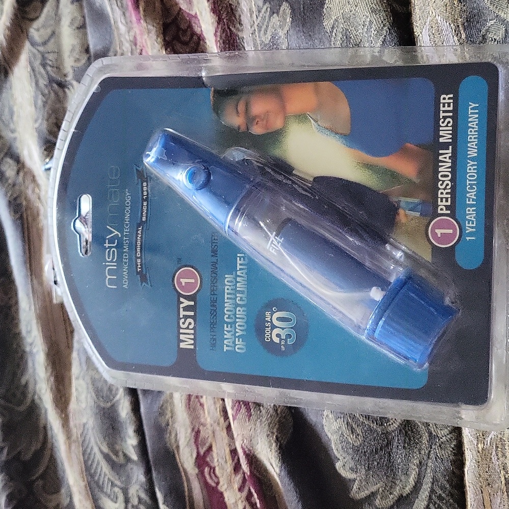 Misty mate sealed fab I use at pool no batteries warranty feels great